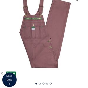 Dickies Women's overalla in purple.
Size small.